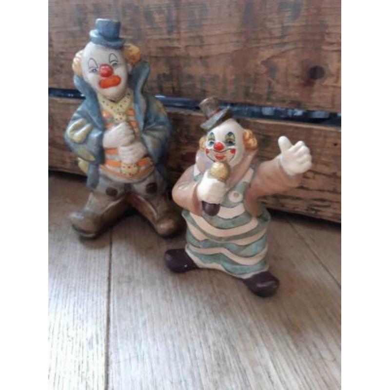 Twee clowns spaarpot beeldjes.zgan