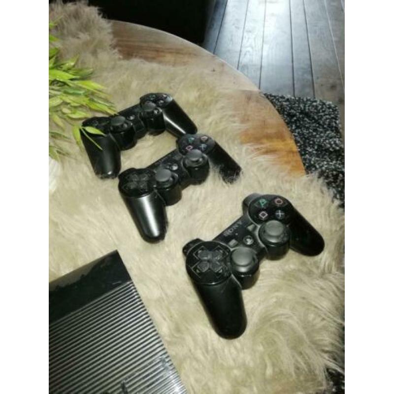 Ps3 met controllers en spellen