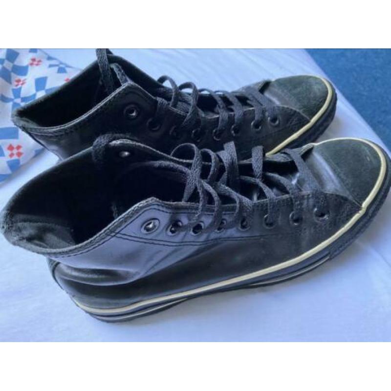 Geleerde zwarte schoenen Converse all stars