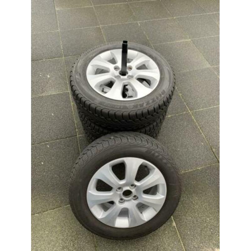 Bridgestone winterbanden incl lichtmetalen velgen 185/60r15