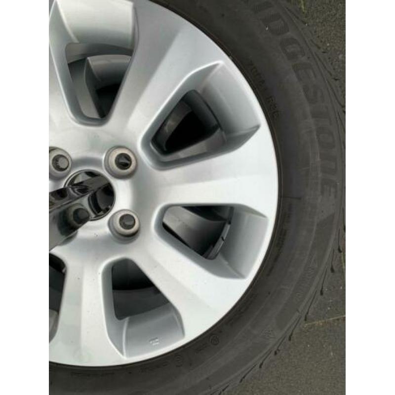 Bridgestone winterbanden incl lichtmetalen velgen 185/60r15